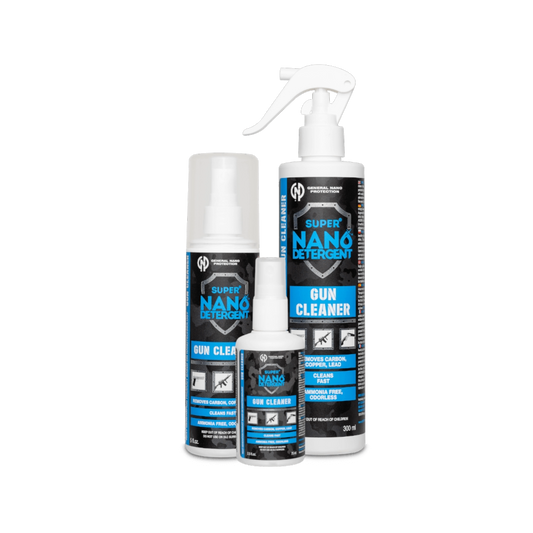Three bottles of gun cleaner in small, medium, and large sizes lined up side-by-side